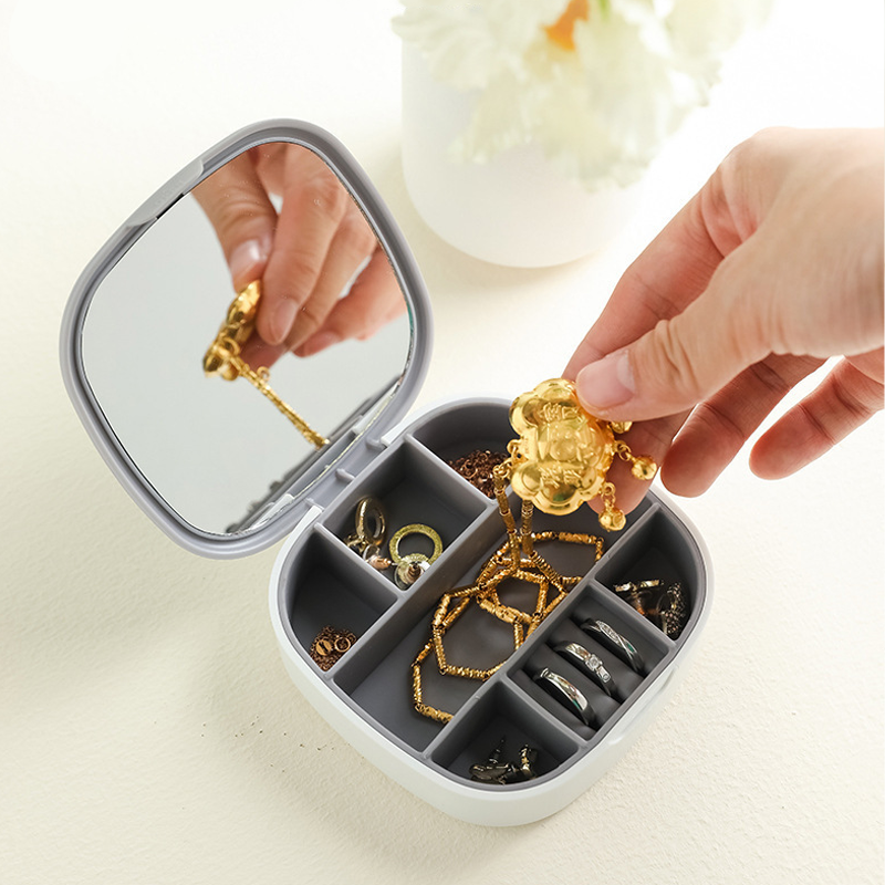 Portable Jewelry Organizer – Compartmentalized Design with Built-in Mirror